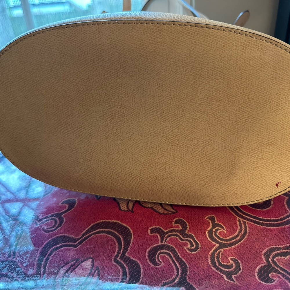 Tan Michael Kors structured purse.